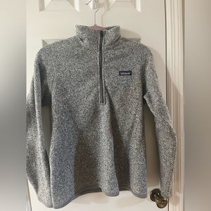 Woman’s gray Patagonia sweater